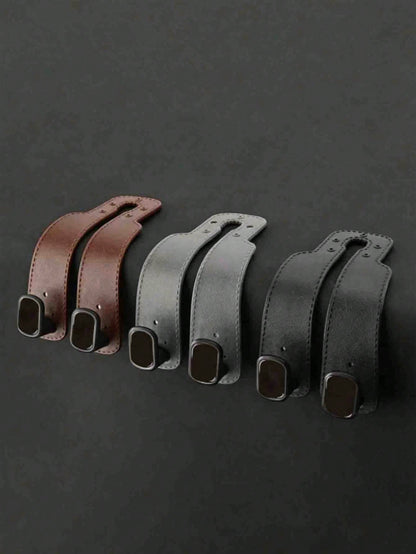 2pcs Universal Car Seat Back PU Leather Headrest Hooks, Retro Minimalist Solid Color Stitched Leather Hanging Strap Hidden High-Load Bearing Car Storage Bracket, Curved Strap Design Rivet Stitched Det