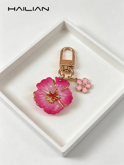 HAILIAN Cute Flower Keychain, Gradient Resin Hibiscus Flower Bag Charm With Mini Flower Pendant, Gold-Plated Keyring, Suitable For Wallet, Backpack, Handbag, Car Keys Decoration, Great Gift For Women