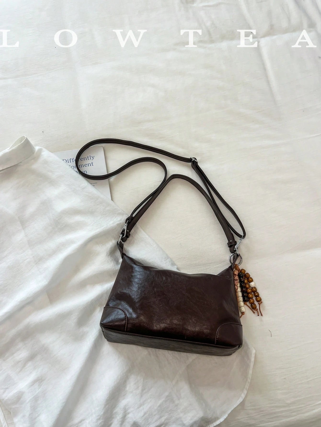 low tea Shoulder Fashion Versatile Dumpling Shaped Bag With Adjustable Strap, Suitable For Commuting, Shopping And More (With Pendant)