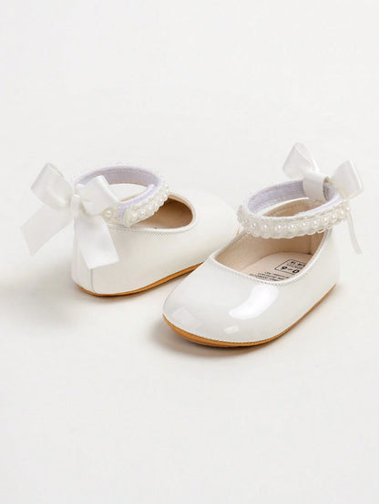 New Baby Girls' Mary Jane Flat Shoes, Bow Design, Non-Slip Soft PU Leather Sole, Infant Toddler Walking Shoes, Pearl Satin Ribbon Decor