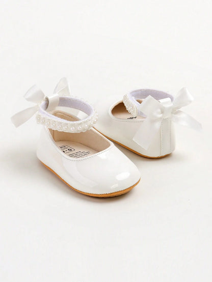 New Baby Girls' Mary Jane Flat Shoes, Bow Design, Non-Slip Soft PU Leather Sole, Infant Toddler Walking Shoes, Pearl Satin Ribbon Decor