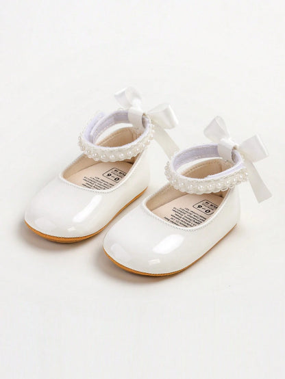 New Baby Girls' Mary Jane Flat Shoes, Bow Design, Non-Slip Soft PU Leather Sole, Infant Toddler Walking Shoes, Pearl Satin Ribbon Decor