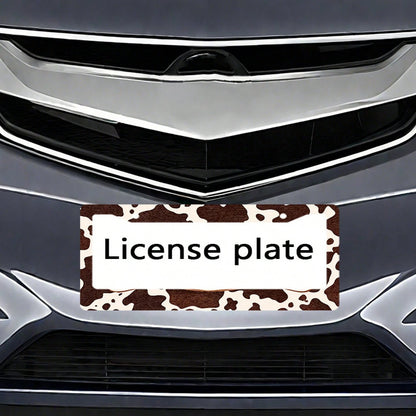 Western Cow Pattern License Plate Frame, Brown And White Cowhide Texture, Aluminum Alloy Material, Suitable For US And International Vehicle Models 12x6inch Includes Screws, Compatible With Most Inter